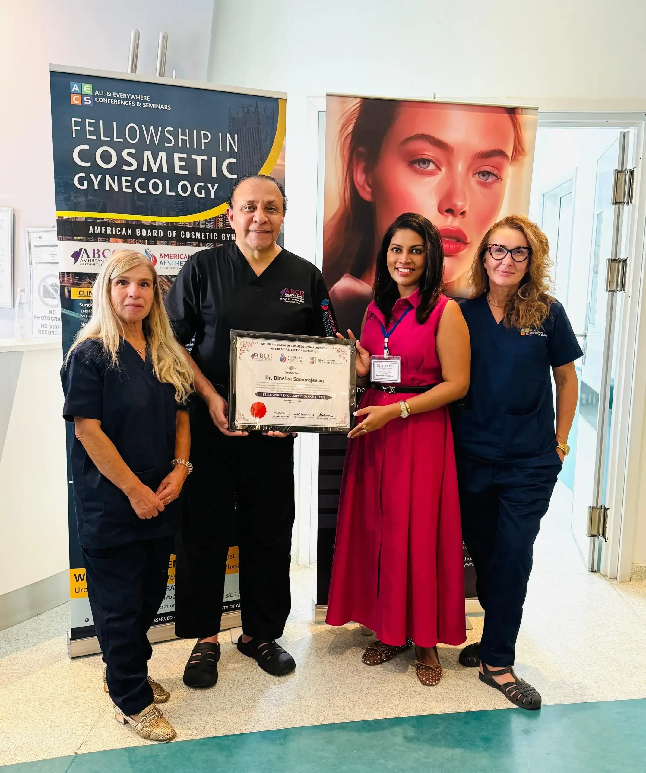 Dr Dineli receiving her Fellowship in Cosmetic Gynaecology certificate from the American Board of Cosmetic Gynaecology